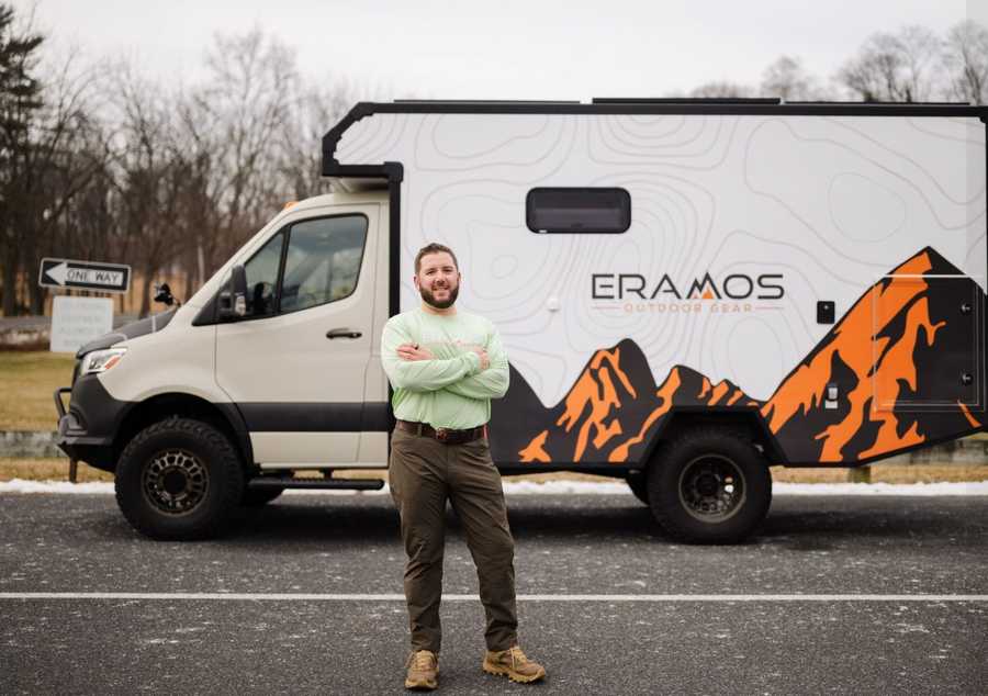 Aaron Baker with Eramos Outdoor Gear expedition vehicle